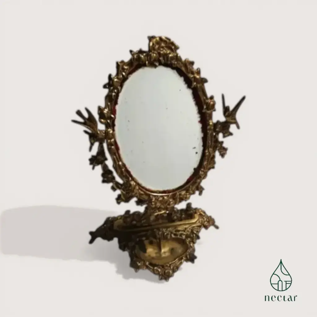 Miroir ancien baroque en laiton doré