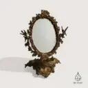 Miroir ancien baroque en laiton doré
