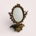 Miroir ancien baroque en laiton doré