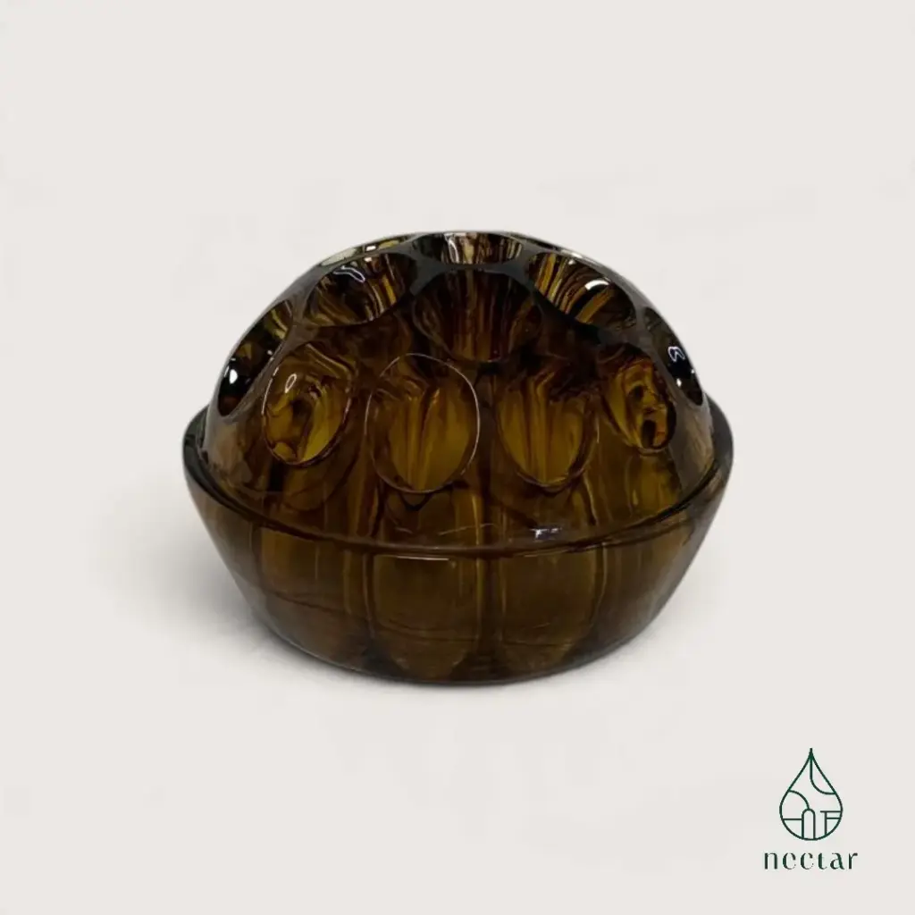Pique-fleurs ancien George Davidson – Verre ambré – 19 trous