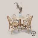 Table ronde avec ses 4 chaises assorties