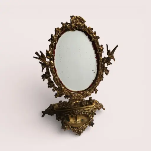 Miroir ancien baroque en laiton doré